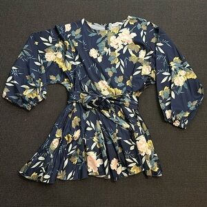 This cute, flirty swing dress from Chicwish is great for any Fall collection!